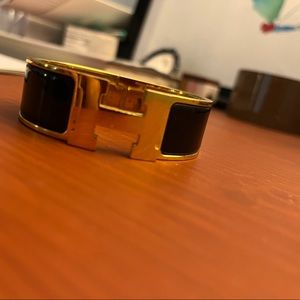 Hermes Clic Clac H bracelet in black and gold